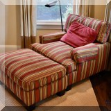 F05. Baker Furniture striped club chair with matching ottoman. Chair: 34”h x 38”w x 43”d Ottoman: 18”h x 36”w x 23”d 